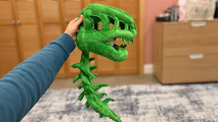 The Popular Plush Dinosaur Skeleton Costume is